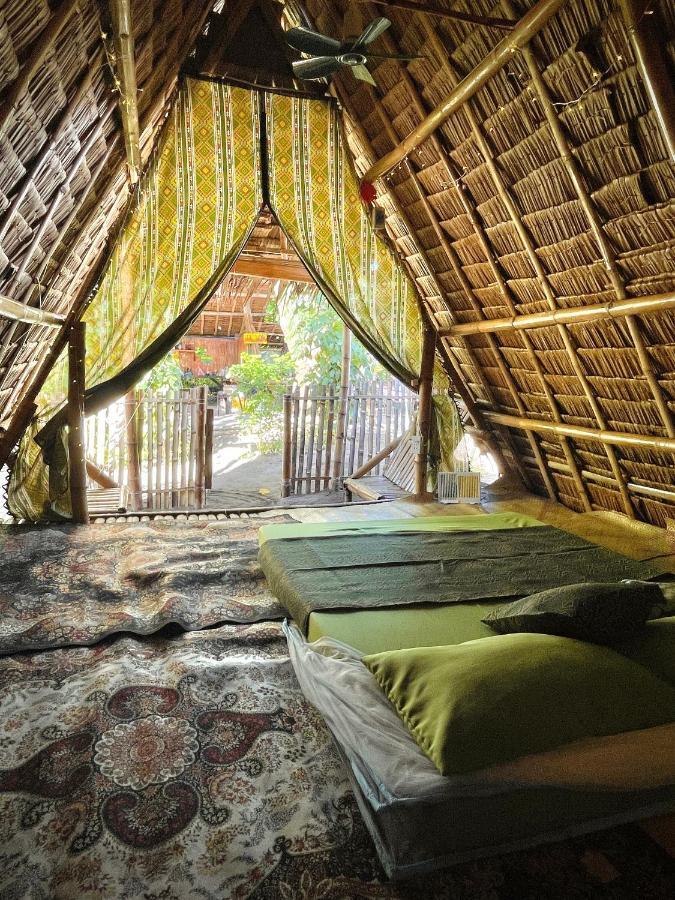 Auberge de jeunesse Tribal Huts Community à Daanbantayan Extérieur photo