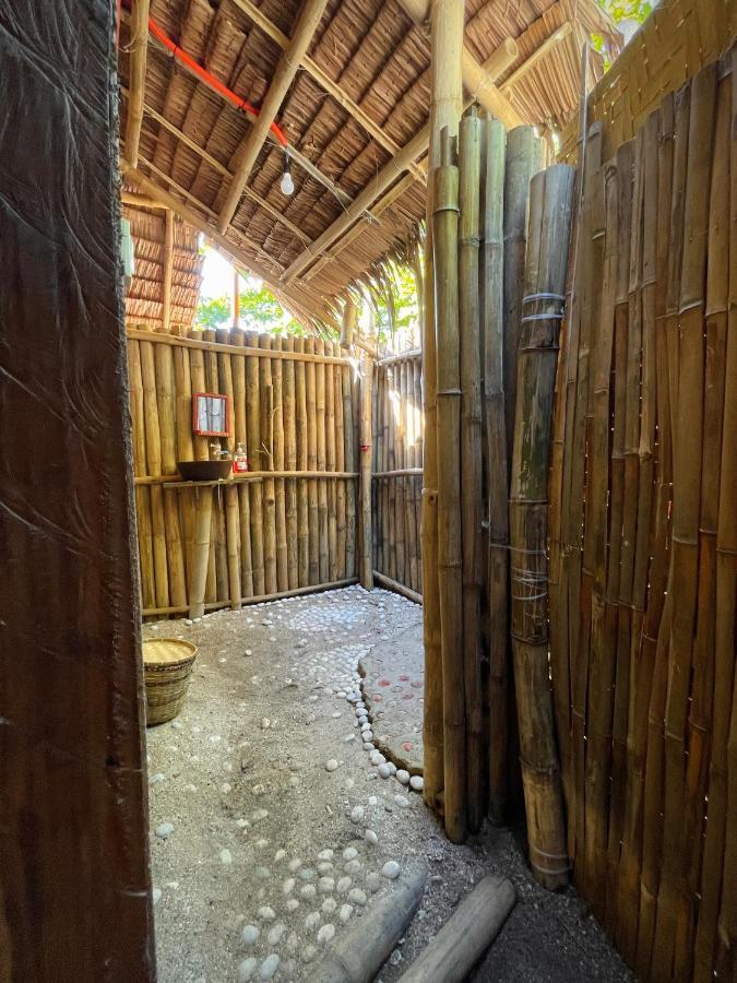 Auberge de jeunesse Tribal Huts Community à Daanbantayan Chambre photo