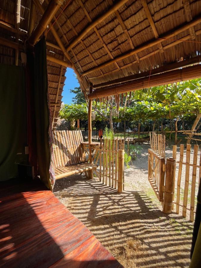 Auberge de jeunesse Tribal Huts Community à Daanbantayan Extérieur photo