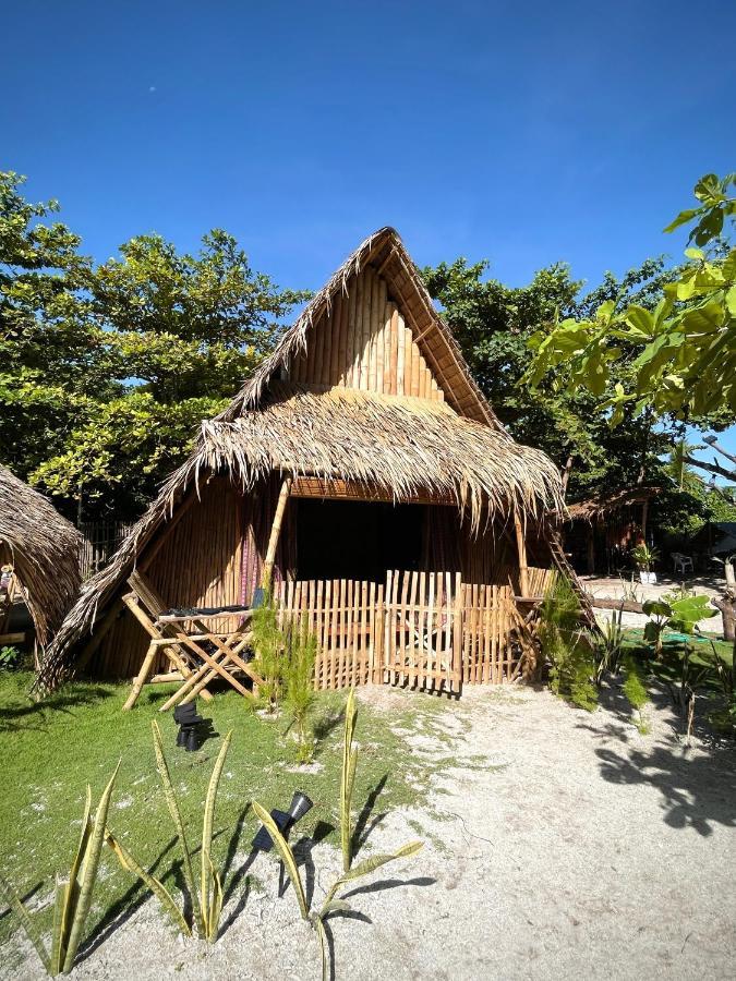 Auberge de jeunesse Tribal Huts Community à Daanbantayan Extérieur photo