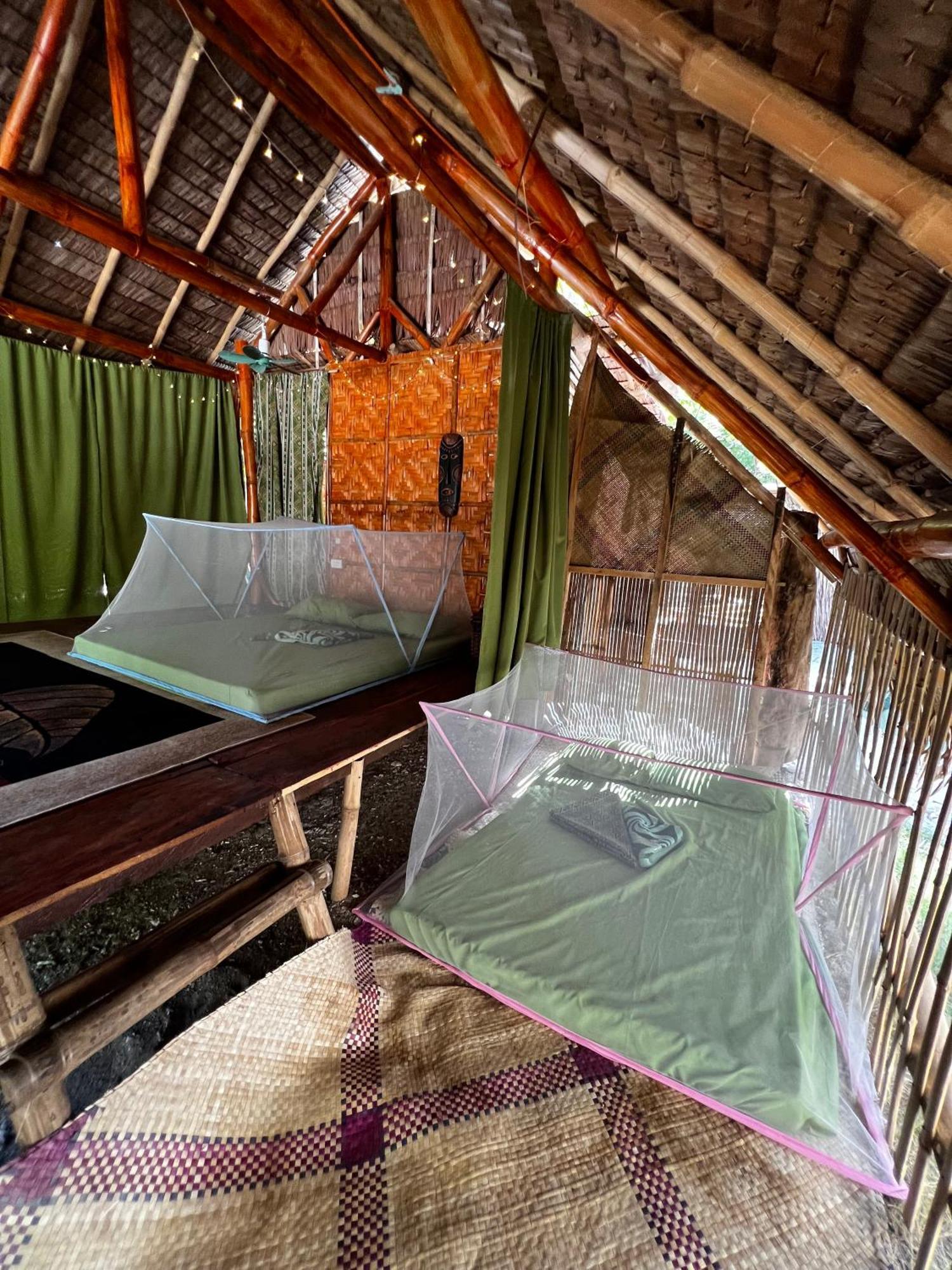 Auberge de jeunesse Tribal Huts Community à Daanbantayan Extérieur photo