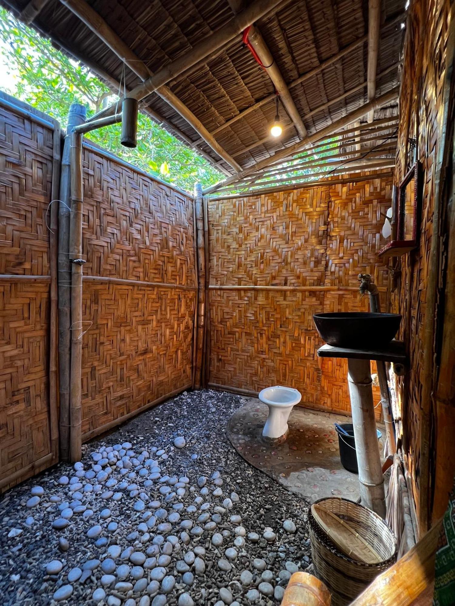 Auberge de jeunesse Tribal Huts Community à Daanbantayan Chambre photo