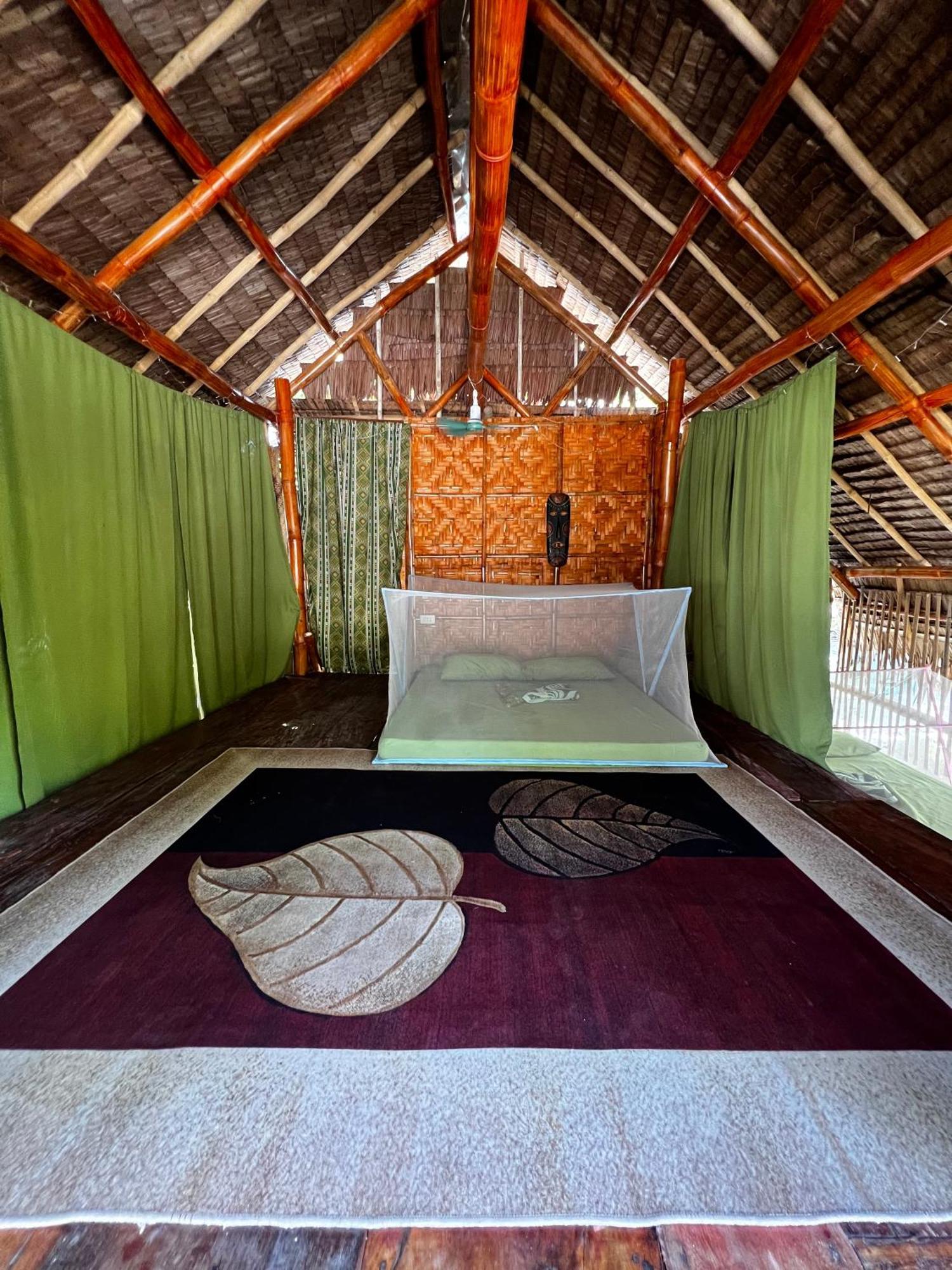 Auberge de jeunesse Tribal Huts Community à Daanbantayan Extérieur photo
